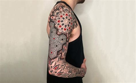 Sacred Images Tattoo And Piercing.